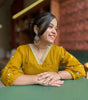 Mustard Yellow Flared Kurta with White Pants – Casual Ethnic Wear for Women
(BLACKLUXE CRAFTS) - BLACKLUXECRAFTS