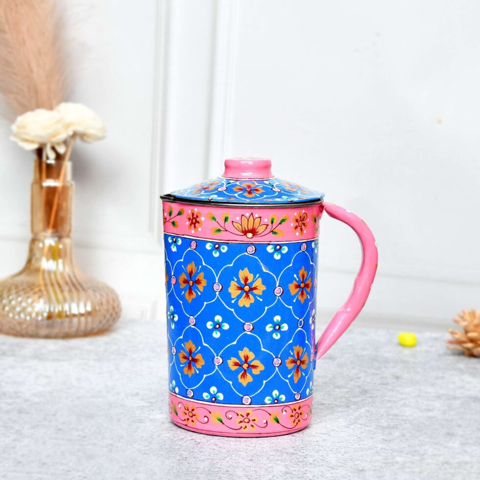 Handmade Rajasthani Hand-Painted Floral Metal Water Jug with Lid – Blue & Pink Ethnic Pitcher for Home Décor & Kitchen
(BLACKLUXE CRAFTS) - BLACKLUXECRAFTS