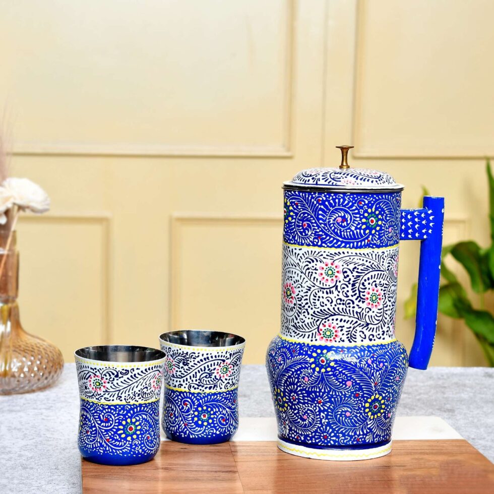 Handmade Rajasthani Hand-Painted Metal Water Jug Set with 2 Glasses – Blue Floral Ethnic Drinkware for Home & Gifting
(BLACKLUXE CRAFTS) - BLACKLUXECRAFTS