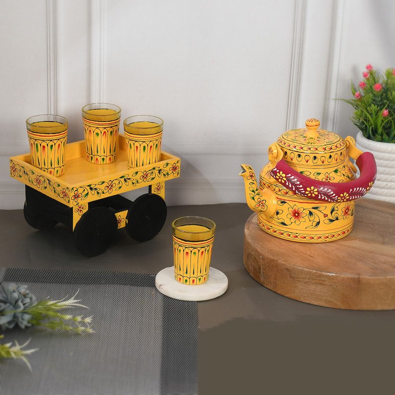 Hand-Painted Yellow Indian Tea Set with Kettle, 4 Glasses & Wooden Cart Holder – Traditional Ethnic Kitchen & Home Décor
(BLACKLUXE CRAFTS) - BLACKLUXECRAFTS