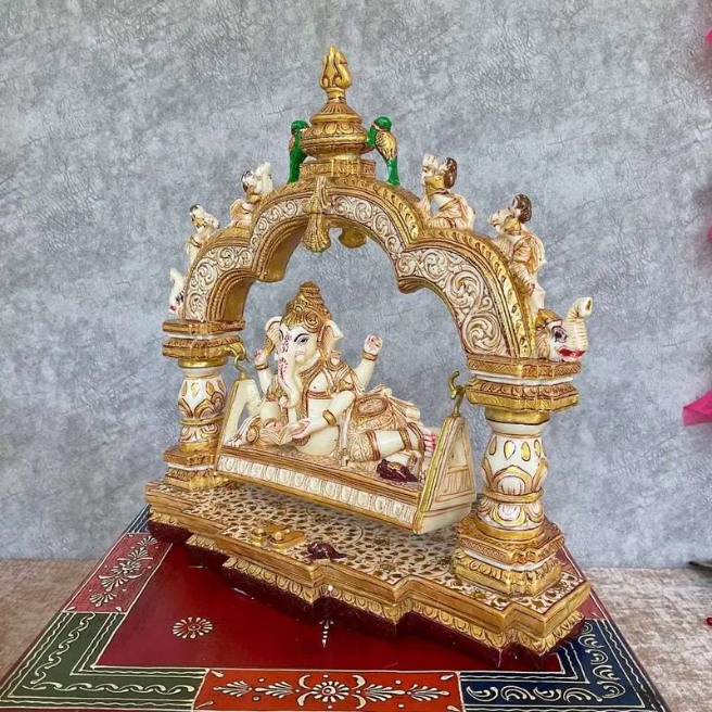 Handcrafted Lord Ganesha on Swing with Ornate Arch – Resin Hindu Statue for Home Decor & Gifts (BLACKLUXE CRAFTS) - BLACKLUXECRAFTS