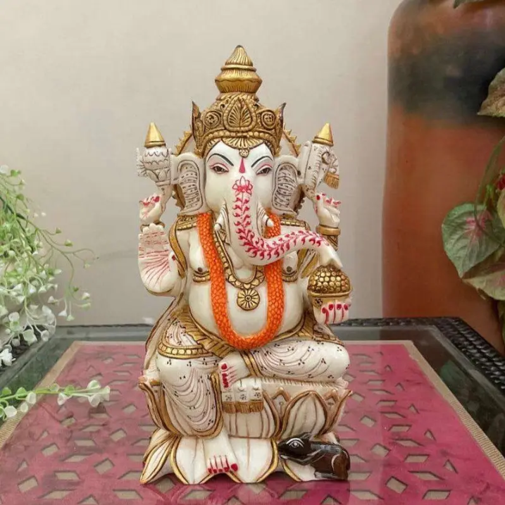 Handcrafted Four-Armed Lord Ganesha Idol with Modak Bowl – Resin Hindu Statue for Home Decor & Spiritual Gifts
(BLACKLUXE CRAFTS) - BLACKLUXECRAFTS