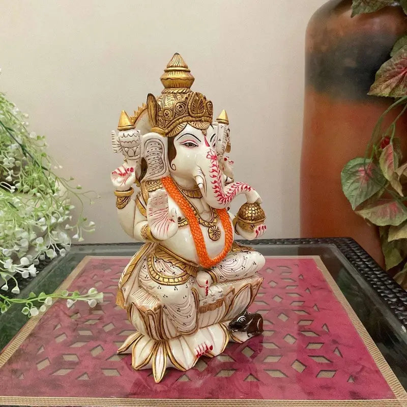 Handcrafted Four-Armed Lord Ganesha Idol with Modak Bowl – Resin Hindu Statue for Home Decor & Spiritual Gifts
(BLACKLUXE CRAFTS) - BLACKLUXECRAFTS