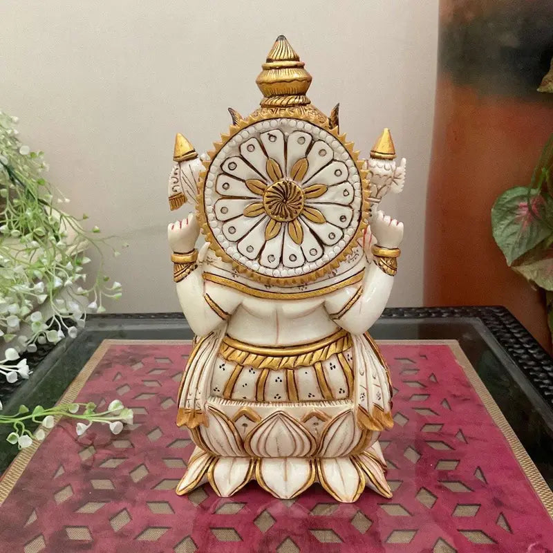 Handcrafted Four-Armed Lord Ganesha Idol with Modak Bowl – Resin Hindu Statue for Home Decor & Spiritual Gifts
(BLACKLUXE CRAFTS) - BLACKLUXECRAFTS
