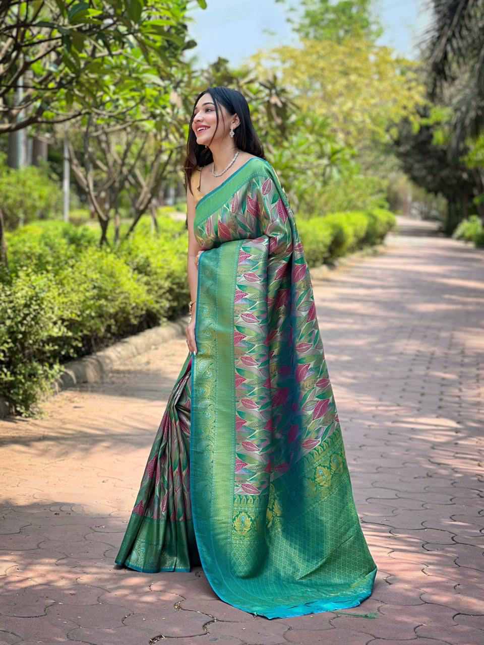 Handmade Green Banarasi Silk Saree with Pink Leaf Motifs & Golden Zari Border – Indian Traditional Wedding & Party Wear (BLACKLUXE CRAFTS)