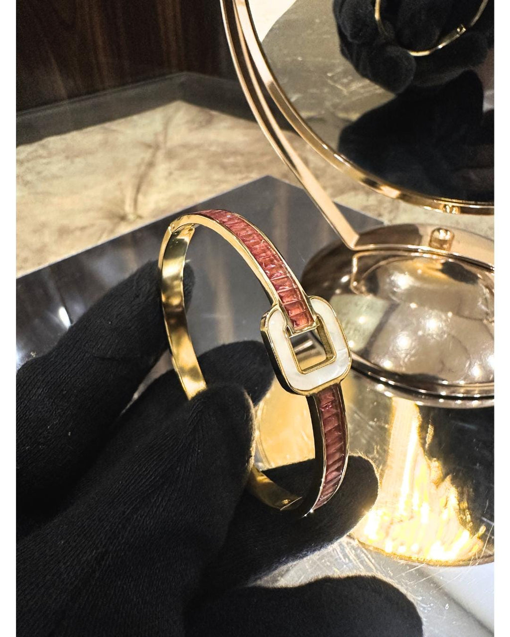 Elegant Gold-Plated Bangle Bracelet with Red Crystal Inlay and Buckle Design – Luxury Adjustable Fashion Jewelry for Women (BLACKLUXE CRAFTS)