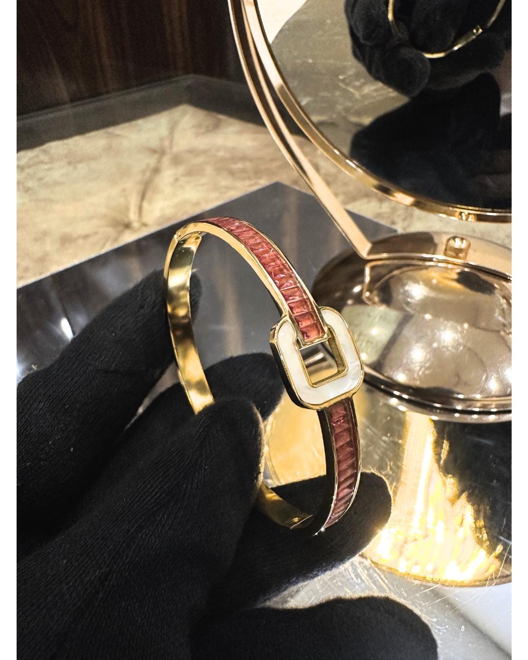 Elegant Gold-Plated Bangle Bracelet with Red Crystal Inlay and Buckle Design – Luxury Adjustable Fashion Jewelry for Women (BLACKLUXE CRAFTS)